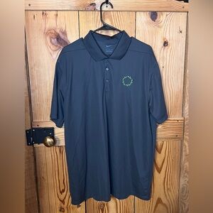 Nike Men's Black Polo Shirt with Green Logo